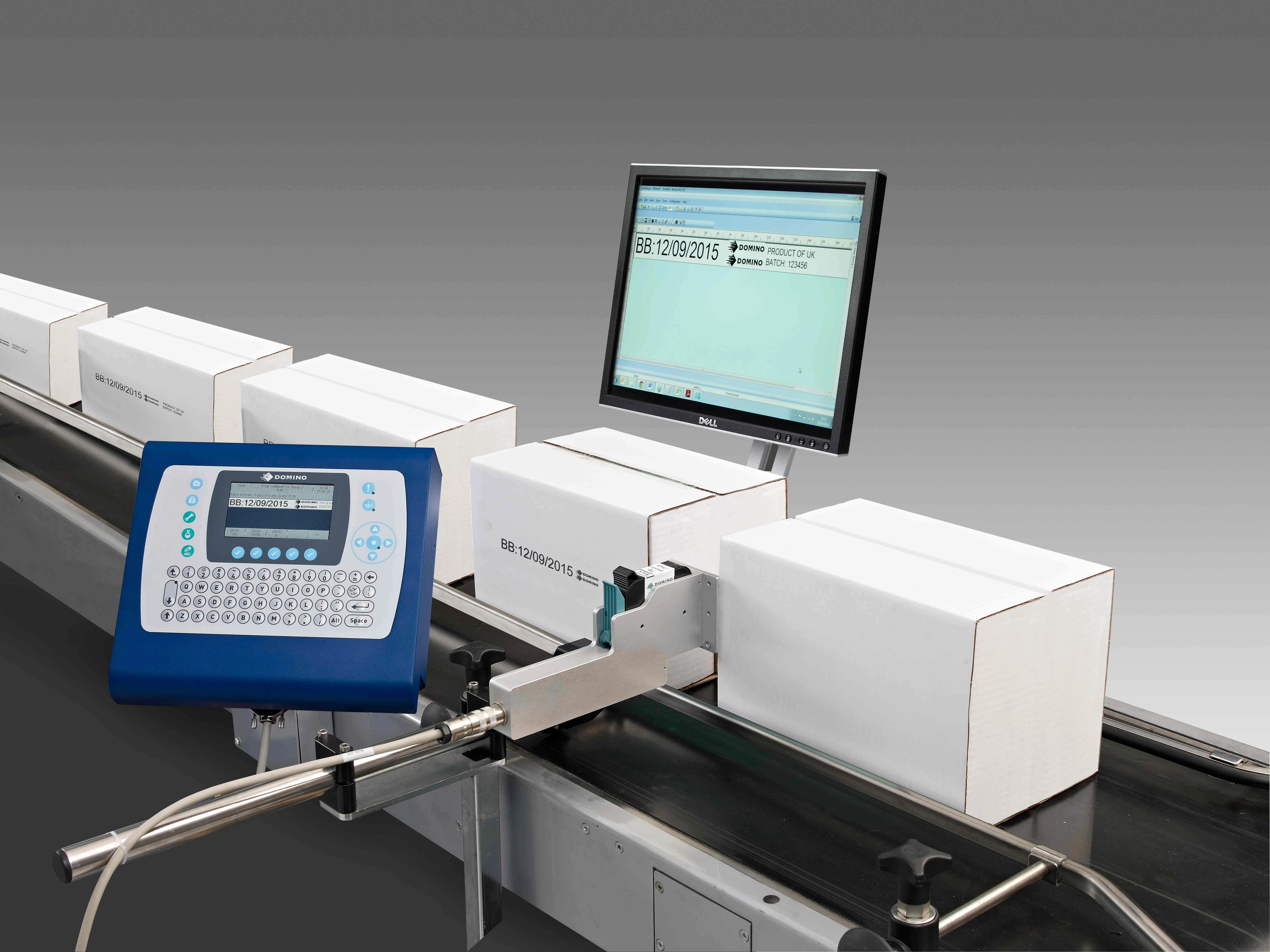 Domino's M-Series print and apply labeller applying label to white cardboard box