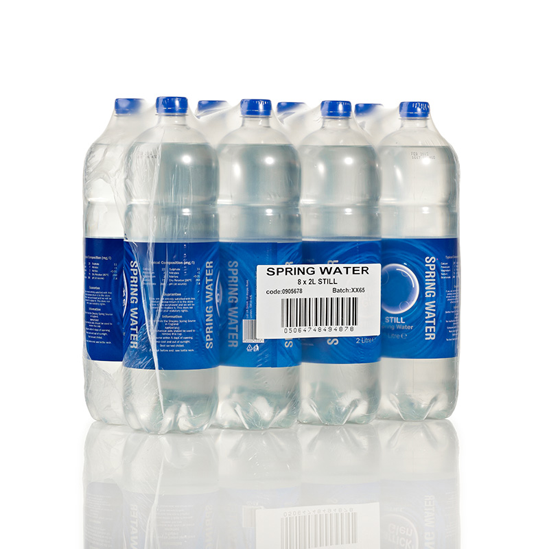 Label from Label Applicator on Shrink Wrap
