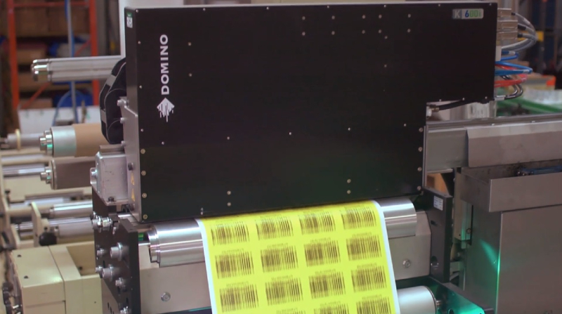 The Domino K600i printing unique barcodes at high speed