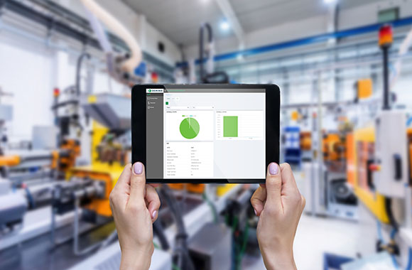 Thumbnail of hands holding a tablet with a pie chart and some graphical information