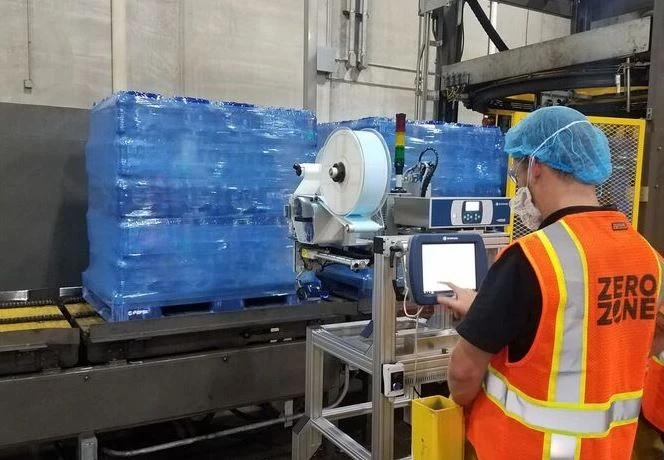 domino print and apply labeller coding on to Pallet