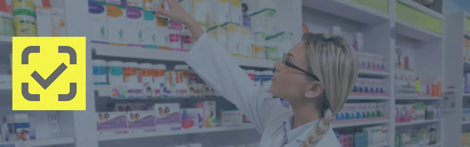 Pharmacist stocking Pharmacy shelves
