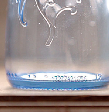 inkjet code on a glass bottle 