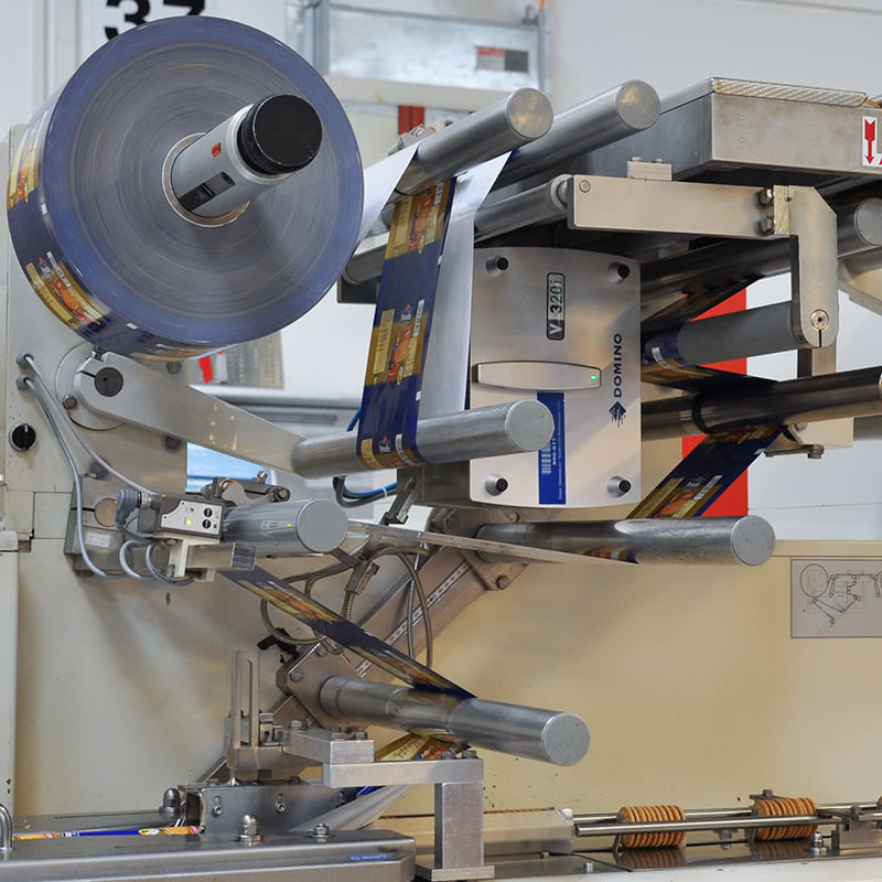 F.Kr. Pjece Kontoret Domino's V-Series Thermal Transfer Over Printers facilitate reliable foil  marking at de Beukelaer | Domino North America