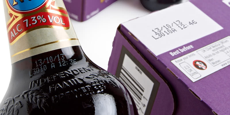 Wells Young close up of expiry date coded bottle and cardboard box 