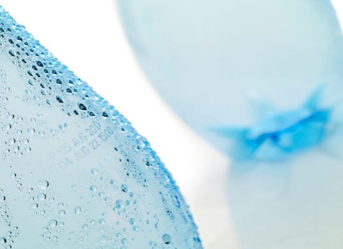 laser code on a wet glass bottle