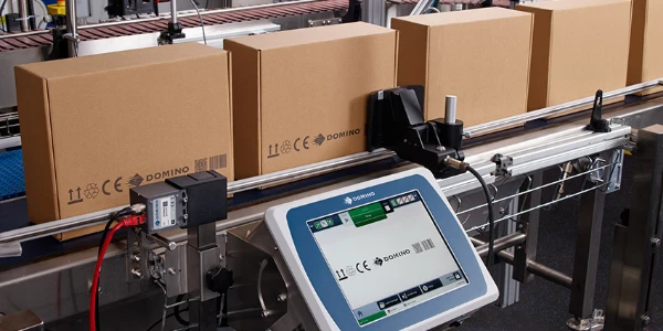 Gx-Series PRO printing onto brown boxes on a production line with UI