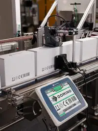 Gx-Series PRO printing onto white boxes on production line