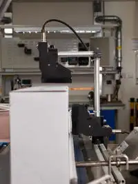Gx-Series PRO printing onto white boxes showing throw distance