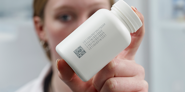 U510 UV laser code on pharma HDPE bottle