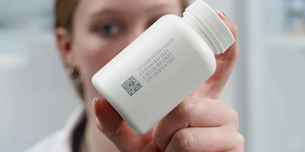 Código láser UV U510 en botella de HDPE farmacéutica